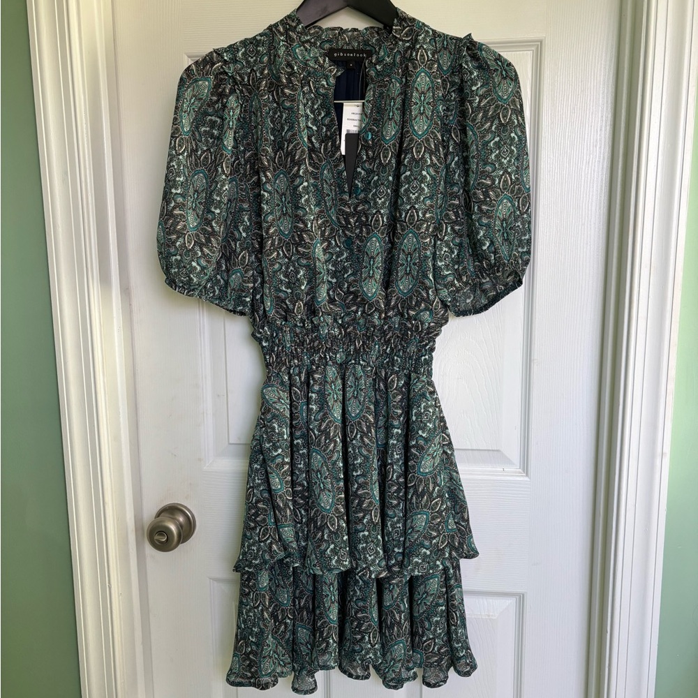 Size S Isla smocked waist bubble sleeve dress in teal green print. NWTO